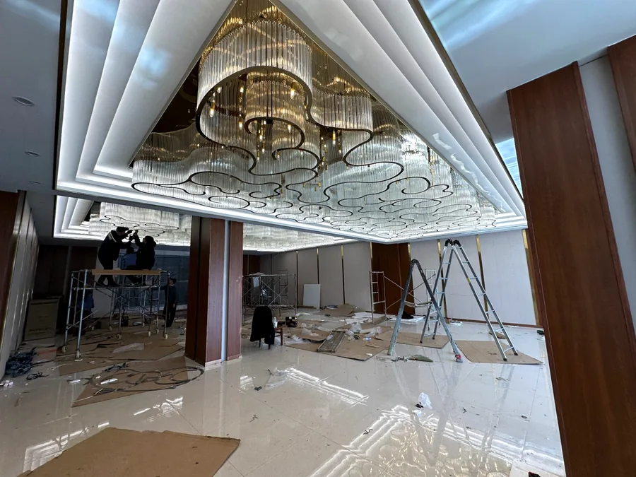 Hotel ballroom &mdash; cloud-outline crystal ceiling during installation
